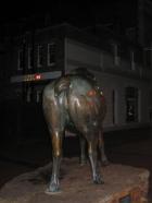 The back end of a horse statue